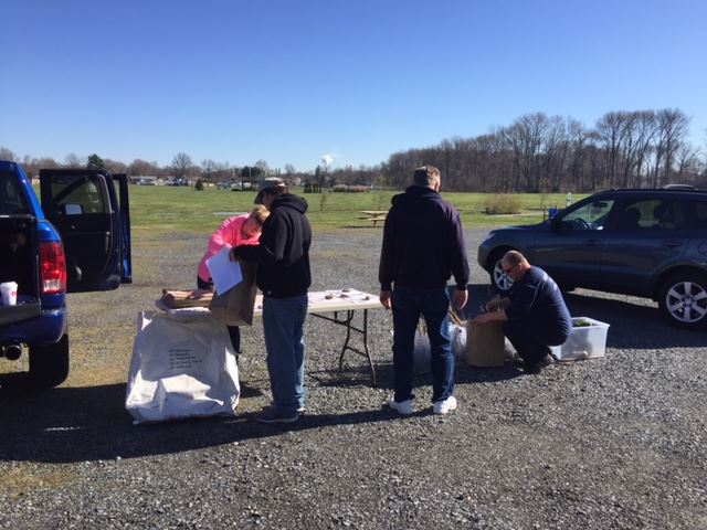 citizens picking up their seedlings